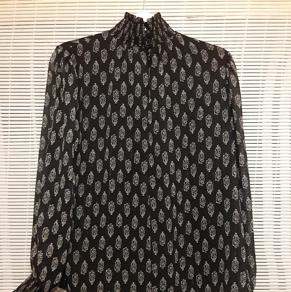 Mock neck blouse.